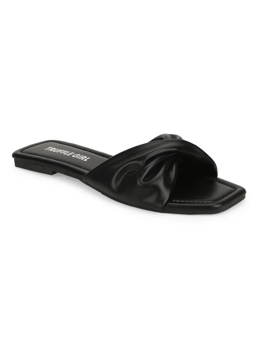 Slip-ons à bride torsadée en PU noir