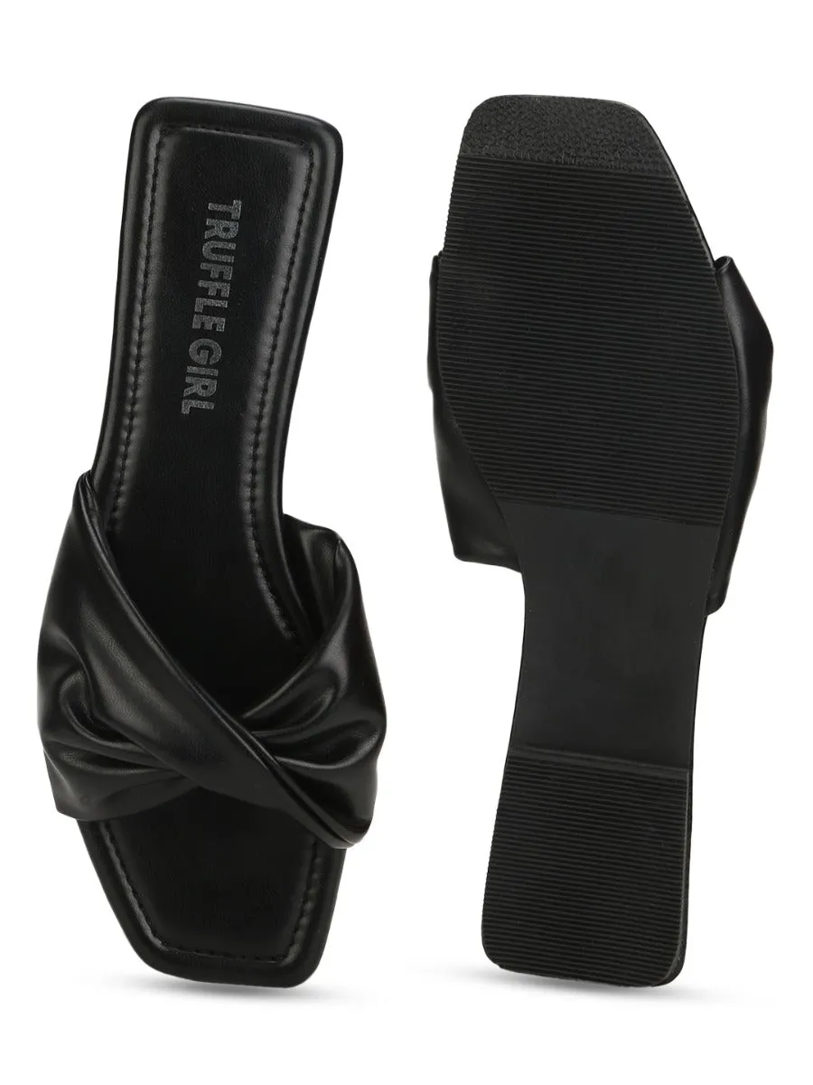 Slip-ons à bride torsadée en PU noir